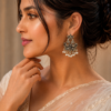 German silver peacock stud earrings with pearl for daily wear.