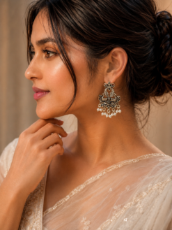 German silver peacock stud earrings with pearl for daily wear.