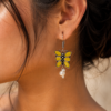 Pair of beautiful brass butterfly hook earrings with sparkling stone accents, ideal for daily wear
