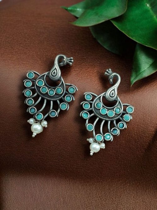 Silver-plated brass peacock stud earrings adorned with sparkling stones, elegant and lightweight