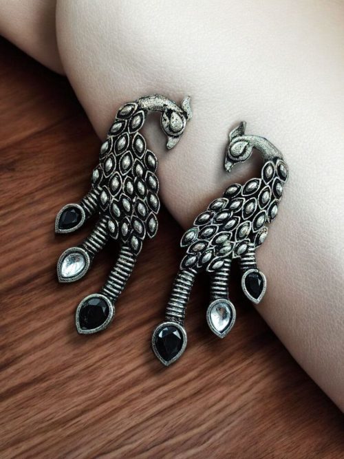 Brass peacock stud earrings with intricate detailing and stone accents, designed for elegant office wear and daily use.