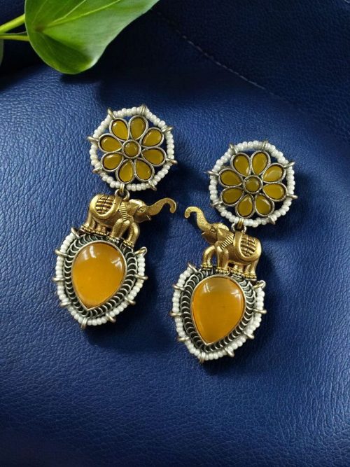 Two-tone elephant dangler earrings with Monalisa stone and pearl work