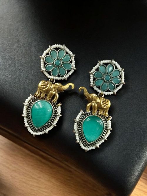 Two-tone elephant dangler earrings with Monalisa stone and pearl work
