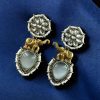 Two-tone elephant dangler earrings with Monalisa stone and pearl work