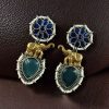 Two-tone elephant dangler earrings with Monalisa stone and pearl work