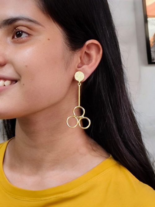 Gold plated dangler earrings with unique ethnic and western fusion design