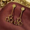 Gold plated dangler earrings with unique ethnic and western fusion design