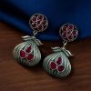 Oxidized silver plated dangler earrings with unique design and stone accents