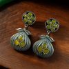 Oxidized silver plated dangler earrings with unique design and stone accents