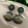 Oxidized silver plated dangler earrings with unique design and stone accents