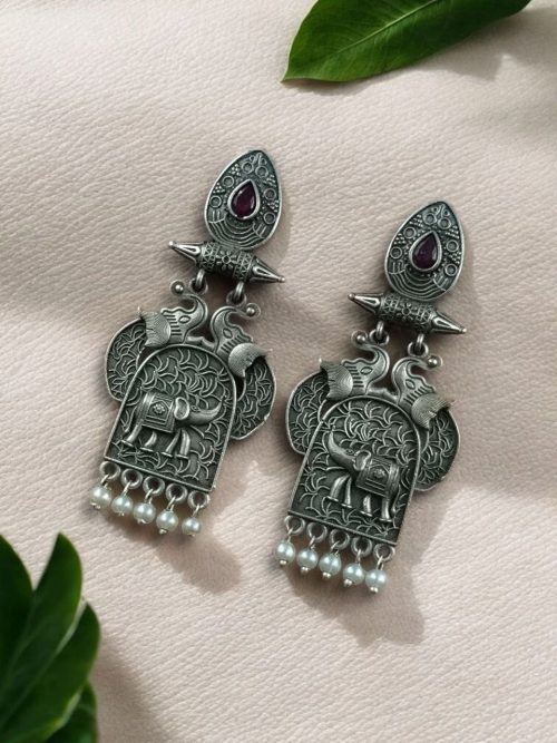 Traditional oxidized elephant earrings with silver finish, stone and pearl work