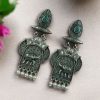 Traditional oxidized elephant earrings with silver finish, stone and pearl work