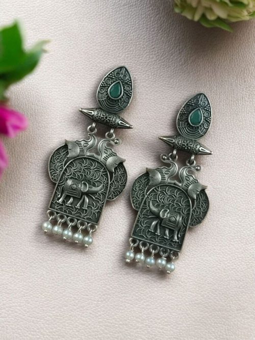 Traditional oxidized elephant earrings with silver finish, stone and pearl work