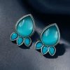 Ethnic silver plated stud earrings with Monalisa stone