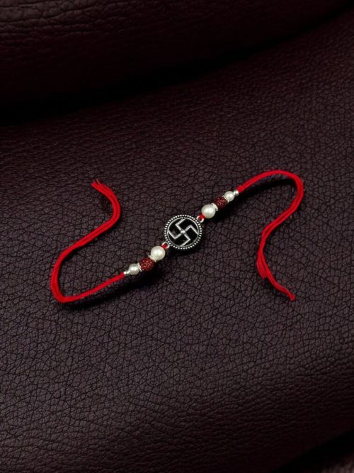 Elegant silver plated Swastik Rakhi with stones for Raksha Bandhan 2025