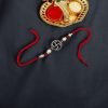 Elegant silver plated Swastik Rakhi with stones for Raksha Bandhan 2025