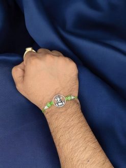 Silver plated Ganesha Rakhi with stones for brother – Raksha Bandhan 2025 gift