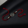 Silver-plated Swastik Rakhi for brother, Raksha Bandhan.