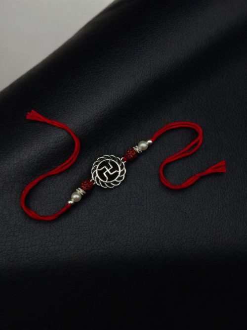 Silver-plated Swastik Rakhi for brother, Raksha Bandhan.