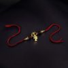 Designer gold-plated Trishul Rakhi for brother, Raksha Bandhan.