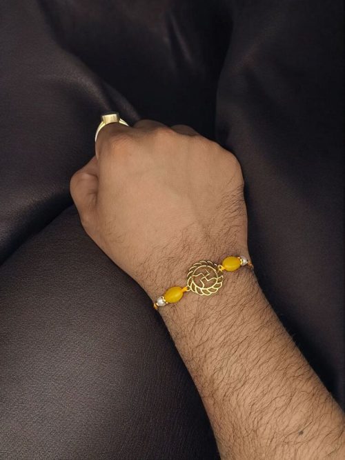 Gold-plated Swastik Rakhi for brother, Raksha Bandhan 2025.