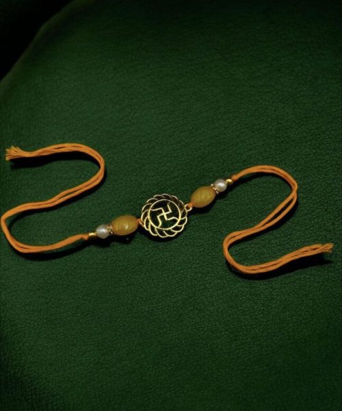 Gold-plated Swastik Rakhi for brother, Raksha Bandhan 2025.