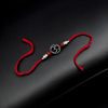 Designer silver-plated Om Rakhi, Raksha Bandhan 2025.