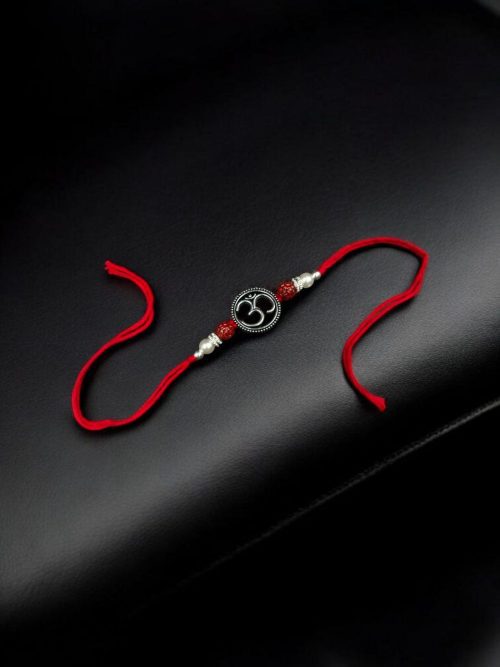 Designer silver-plated Om Rakhi, Raksha Bandhan 2025.