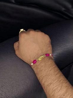 Gold plated Lord Shiv Rakhi for brother.