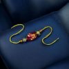 Kids' Tom & Jerry gold-plated resin Rakhi.