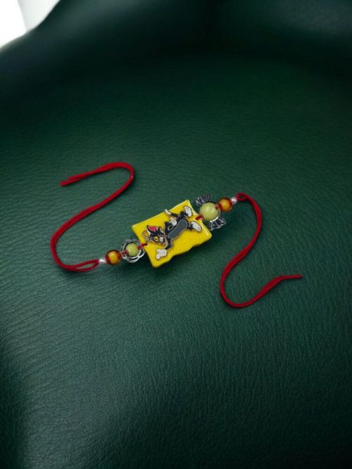 Kids' gold-plated Tom Resin Rakhi.