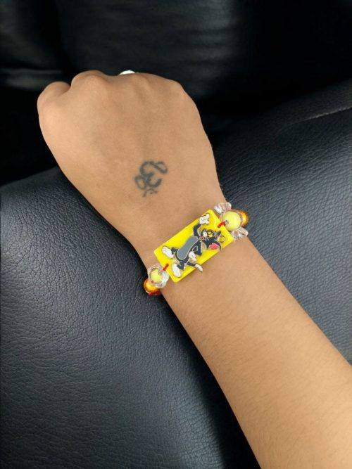 Kids' gold-plated Tom Resin Rakhi.