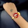 Kids' gold-plated Doll Resin Rakhi.