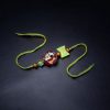 Kids' gold-plated Doll Resin Rakhi.