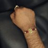 Premium oxidized gold-plated Trishul Rakhi for brother.