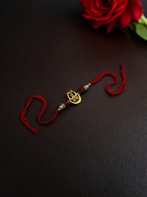 Premium oxidized gold-plated Trishul Rakhi for brother.