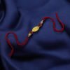 Handcrafted oxidized gold plated Rakhi