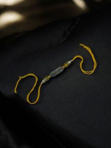 Buy Trendy Oxidized Rakhi Online for Your Brother This Raksha Bandhan - color: "Silver"