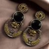 Two-tone ethnic elephant dangler earrings for women