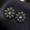 Oxidized silver plated flower stud earrings with stone work