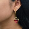Gold plated brass earrings featuring contemporary design with elegant stone accents, perfect for both casual and formal occasions.