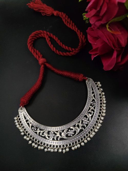 Traditional pearl floral choker necklace with adjustable thread for ethnic wear.