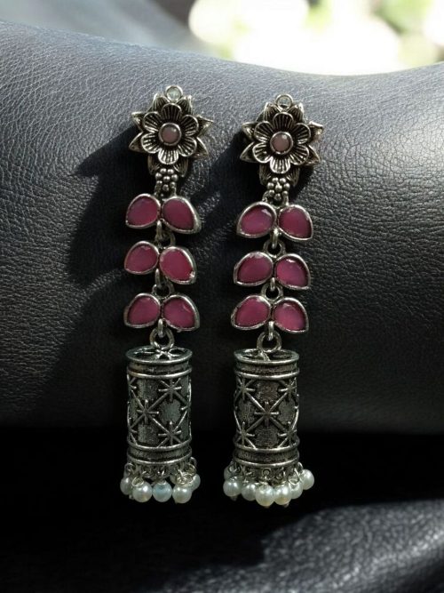 Silver plated oxidized jhumki earrings with stone and pearl detailing in traditional ethnic design