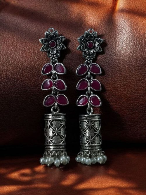 Silver plated oxidized jhumki earrings with stone and pearl detailing in traditional ethnic design