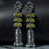 Silver plated oxidized jhumki earrings with stone and pearl detailing in traditional ethnic design