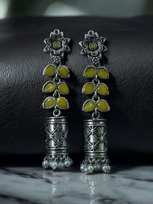 Silver plated oxidized jhumki earrings with stone and pearl detailing in traditional ethnic design