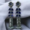 Silver plated oxidized jhumki dangler earrings with stone and pearl detailing in traditional ethnic design