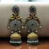 Two-tone parrot earrings with jhumka design, pearl and stone detailing