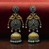 Two-tone parrot earrings with jhumka design, pearl and stone detailing