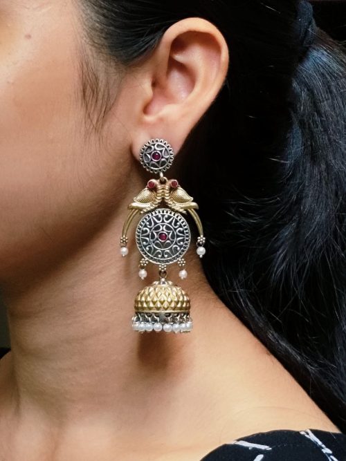 Two-tone parrot earrings with jhumka design, pearl and stone detailing